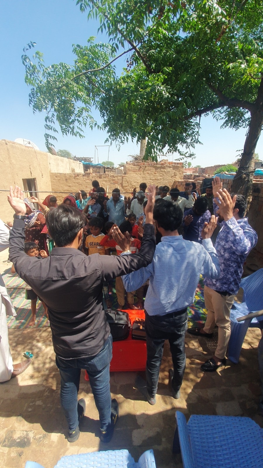 Pakistan ministry community gathering outdoors