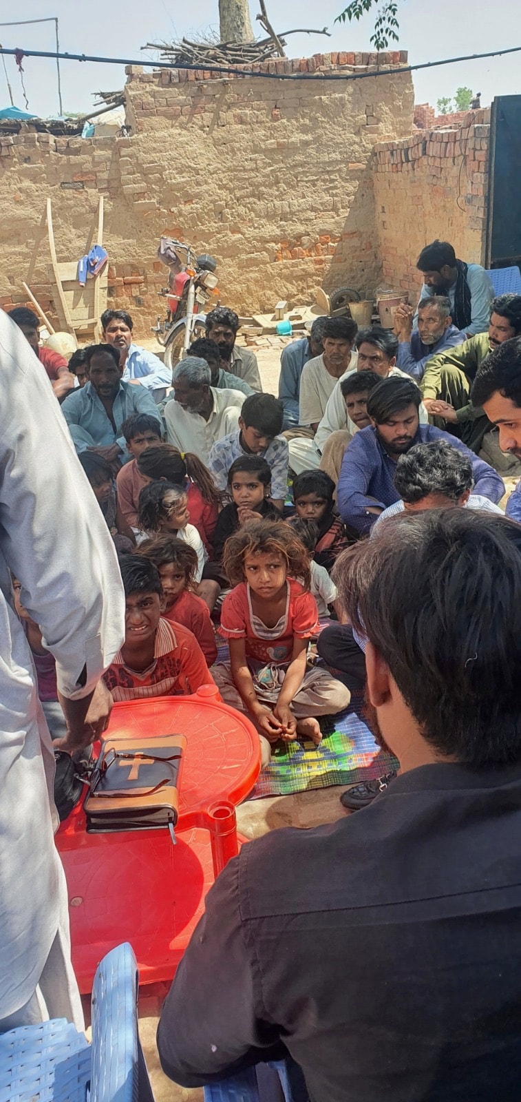 Large outdoor community gathering for ministry in Pakistan